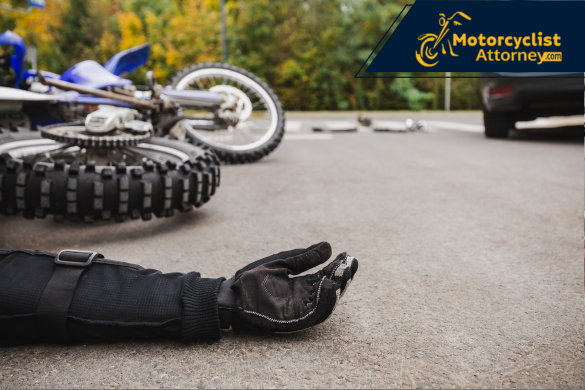 A motorcyclist lies on the pavement next to a downed motorcycle following a crash, symbolizing the severity of highway collisions. The image reflects the tragic Highway 50 accident that claimed the life of Brian Shaw and injured several others, as reported by Motorcyclist Attorney.