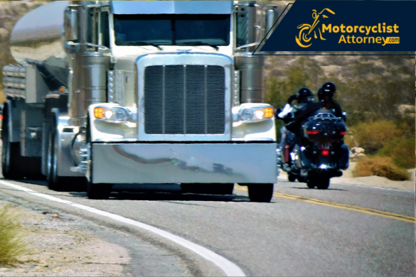 A semi-truck approaches on a two-lane highway as two motorcyclists ride alongside, symbolizing the risks of sharing the road with large commercial vehicles. The image reflects the recent Highway 14 crash that left one rider seriously injured, as reported by Motorcyclist Attorney.